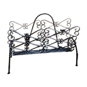 Vintage black wrought iron magazine rack