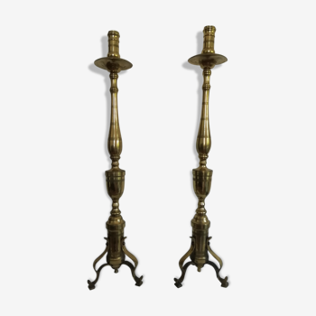 Pair of bronze and brass torch candlesticks