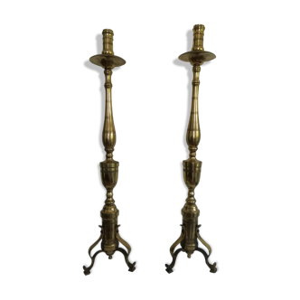 Pair of bronze and brass torch candlesticks