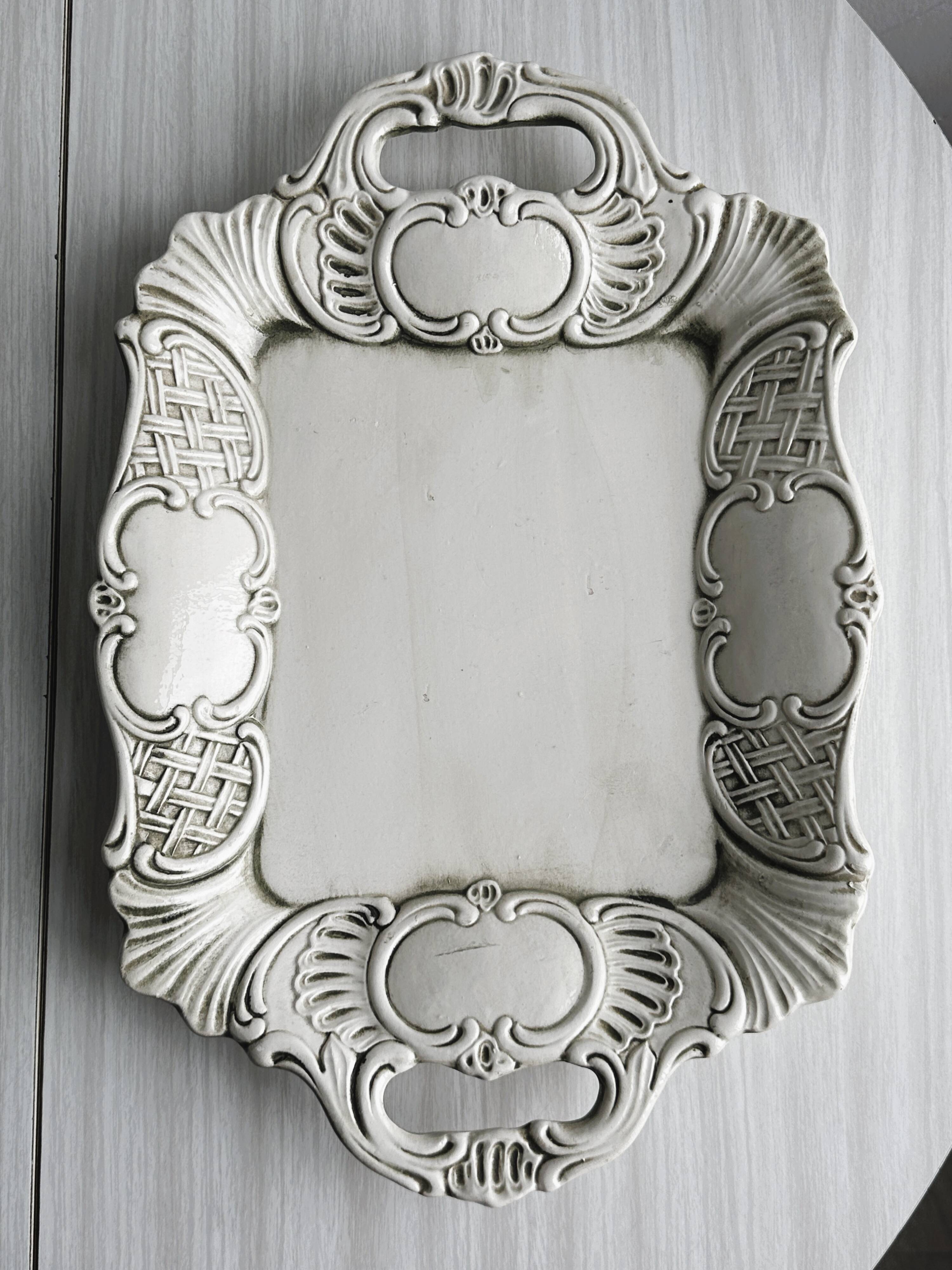 Old white ceramic tray, old dish.