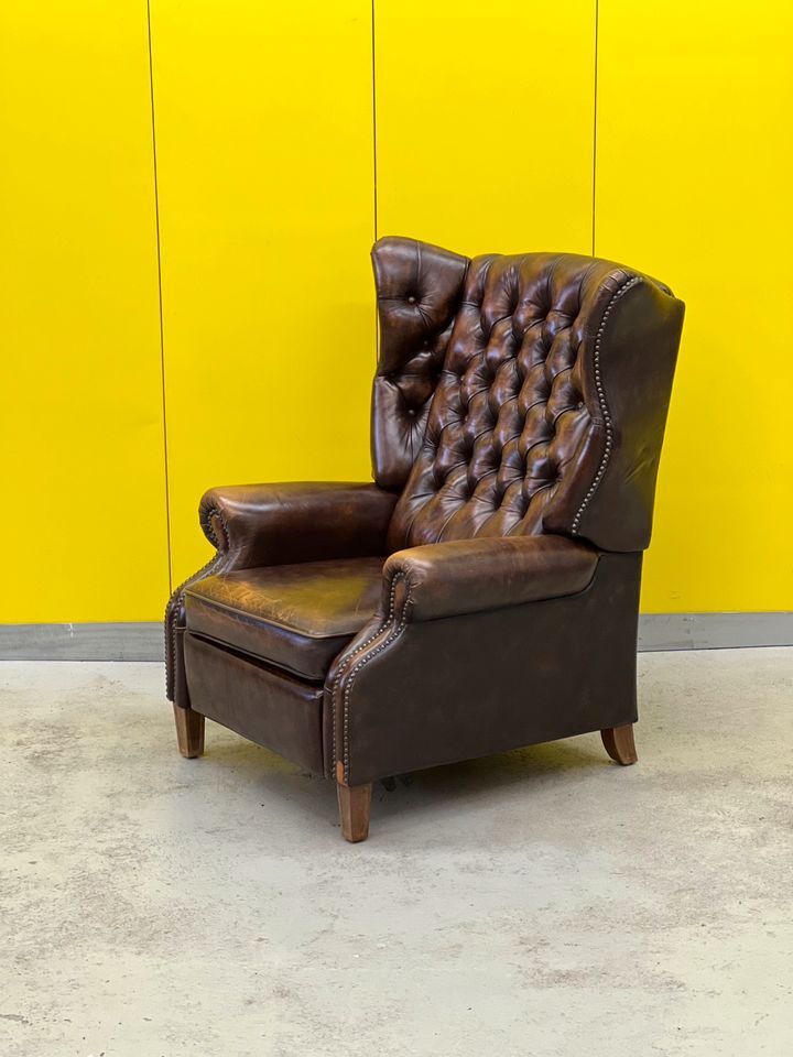 Brown vintage handmade chesterfield recliner armchair