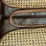 Thonet rocking chair in curved wood and cane from the 1900s