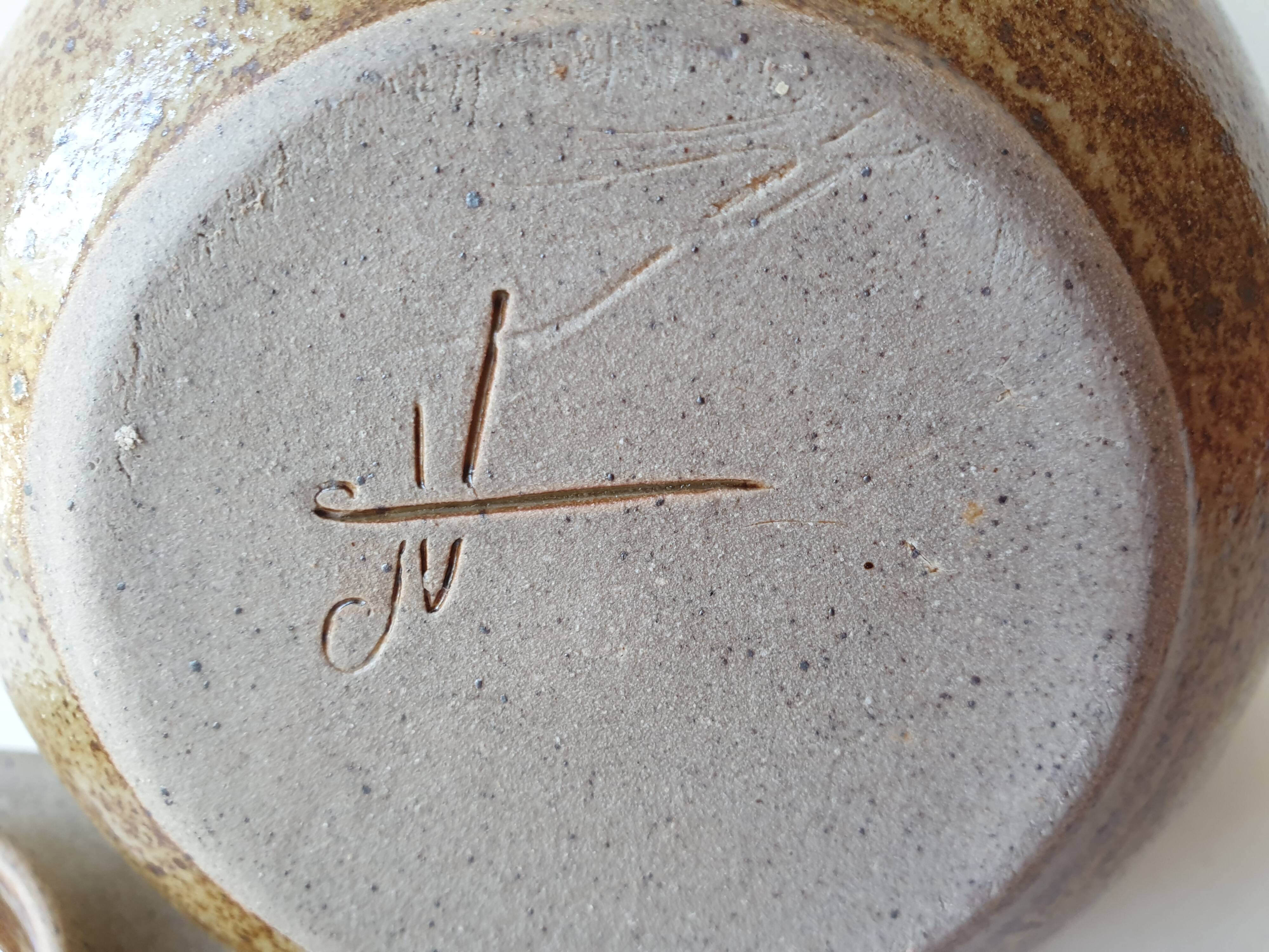 Small teapot in pyrite stoneware ceramic signed NC (Signature to be identified)