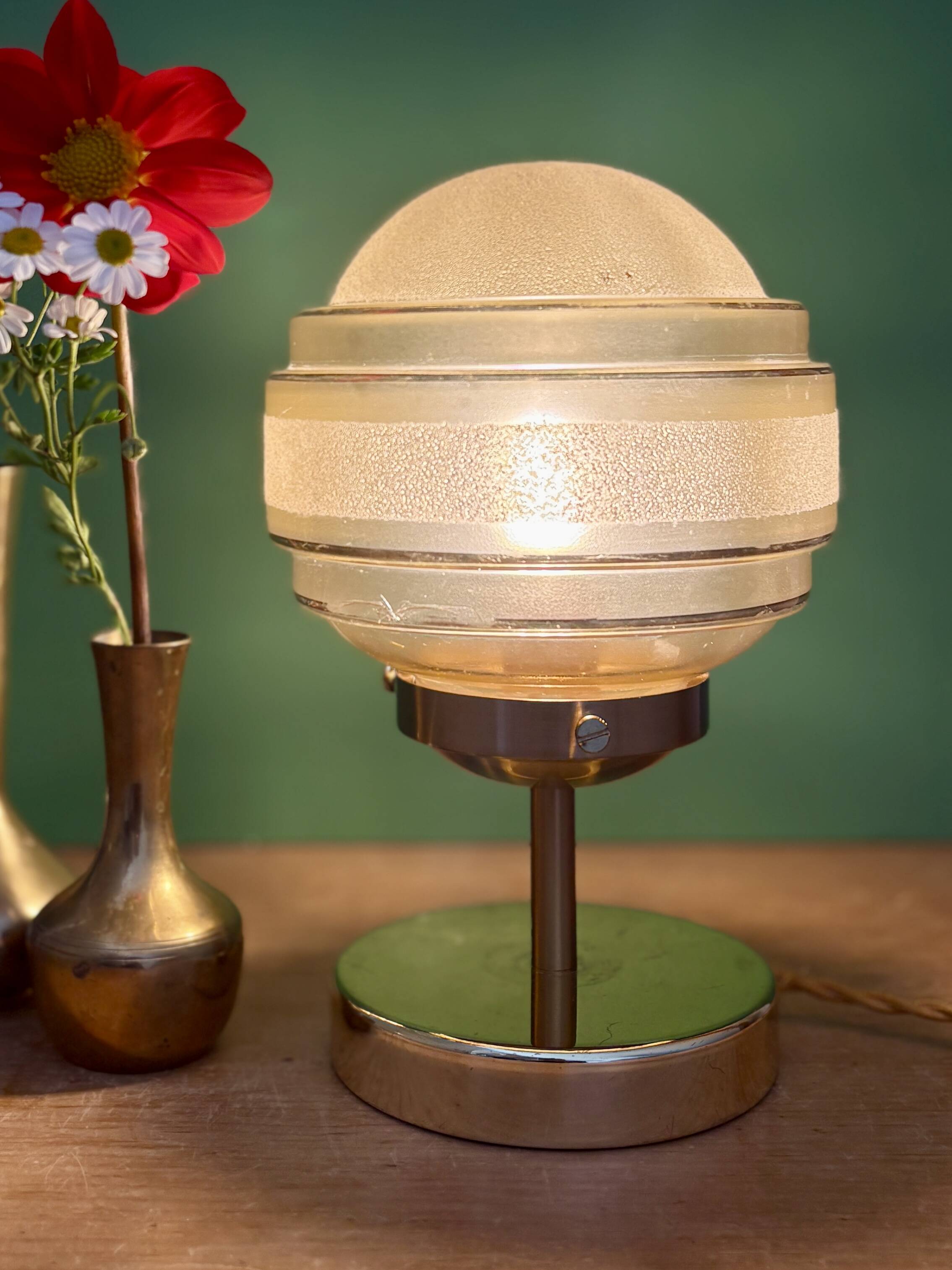 Vintage globe table lamp in frosted yellow and gold glass.