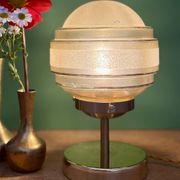 Lampe à poser globe vintage en verre granité jaune et doré