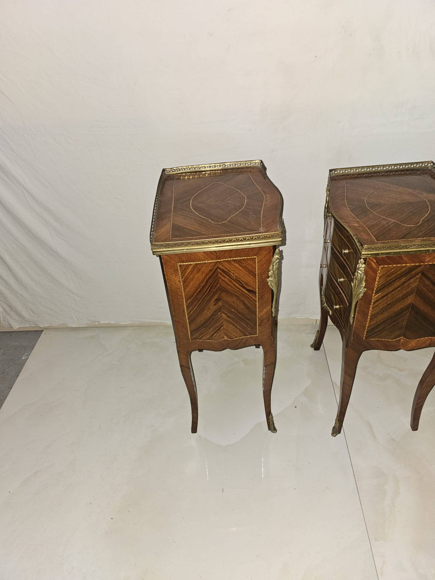 Pair of Louis XV style bedside tables in marquetry