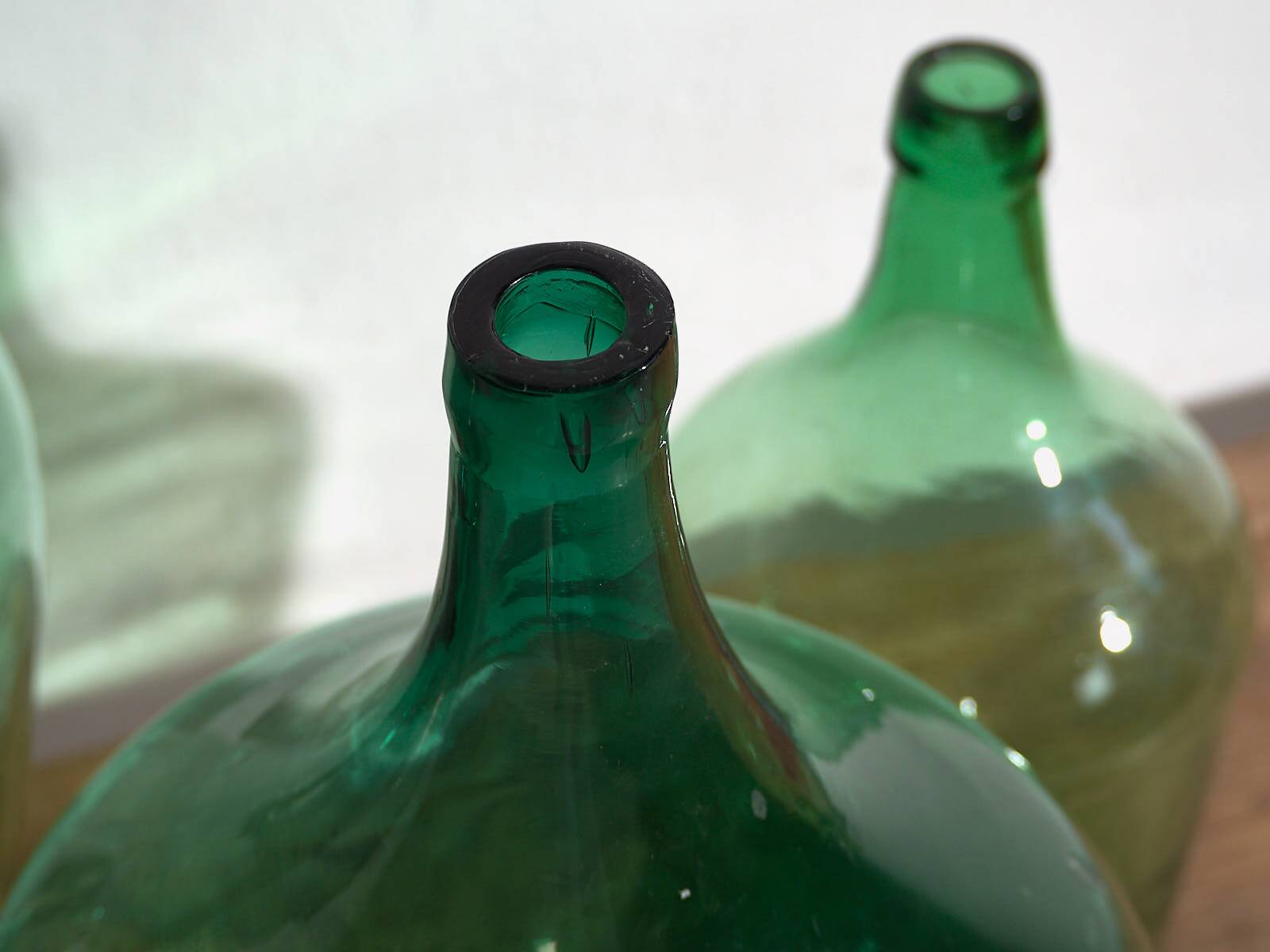 Antique green demijohns (c.1920). 3-piece set #6