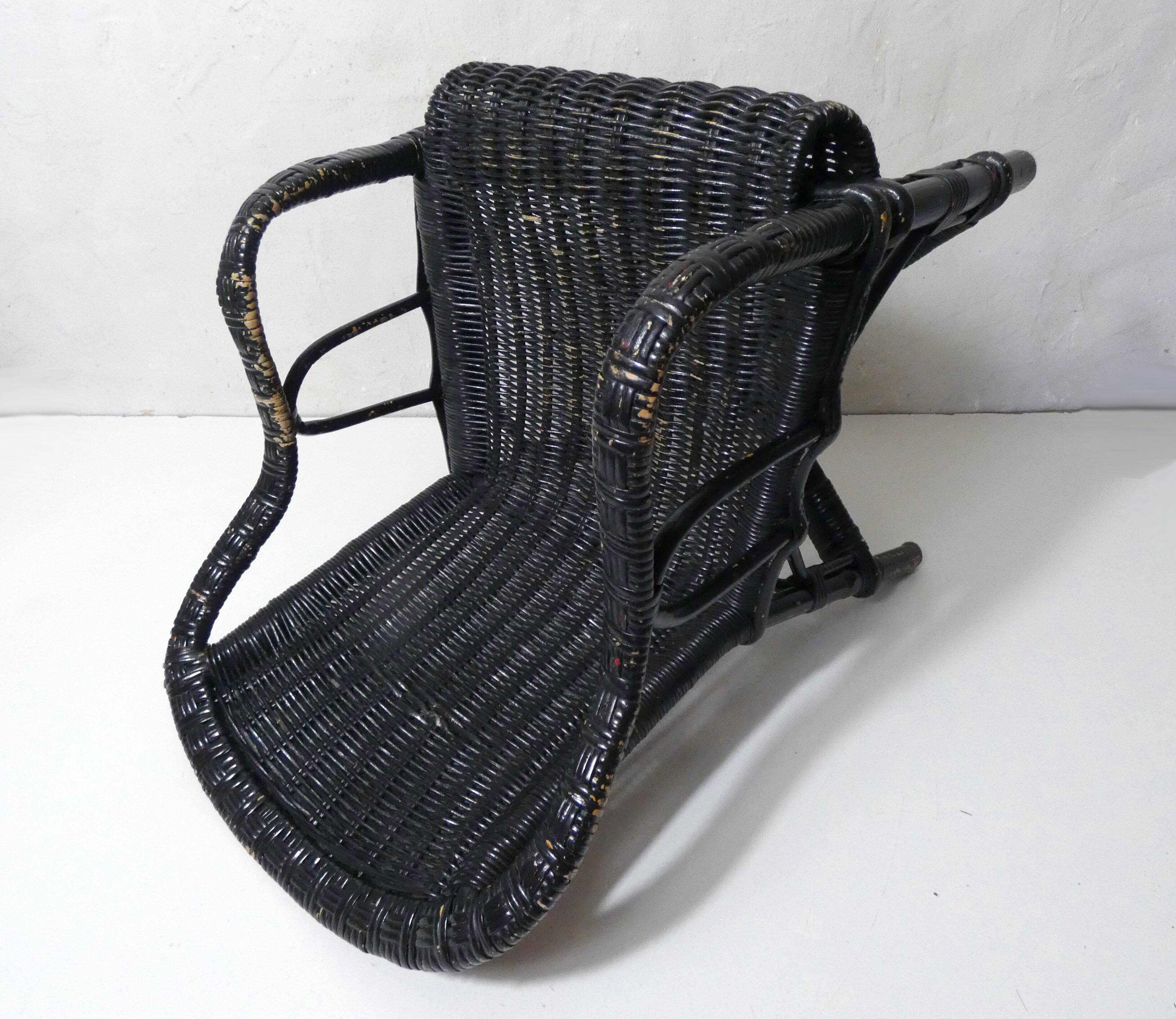 Vintage children's size rattan armchair