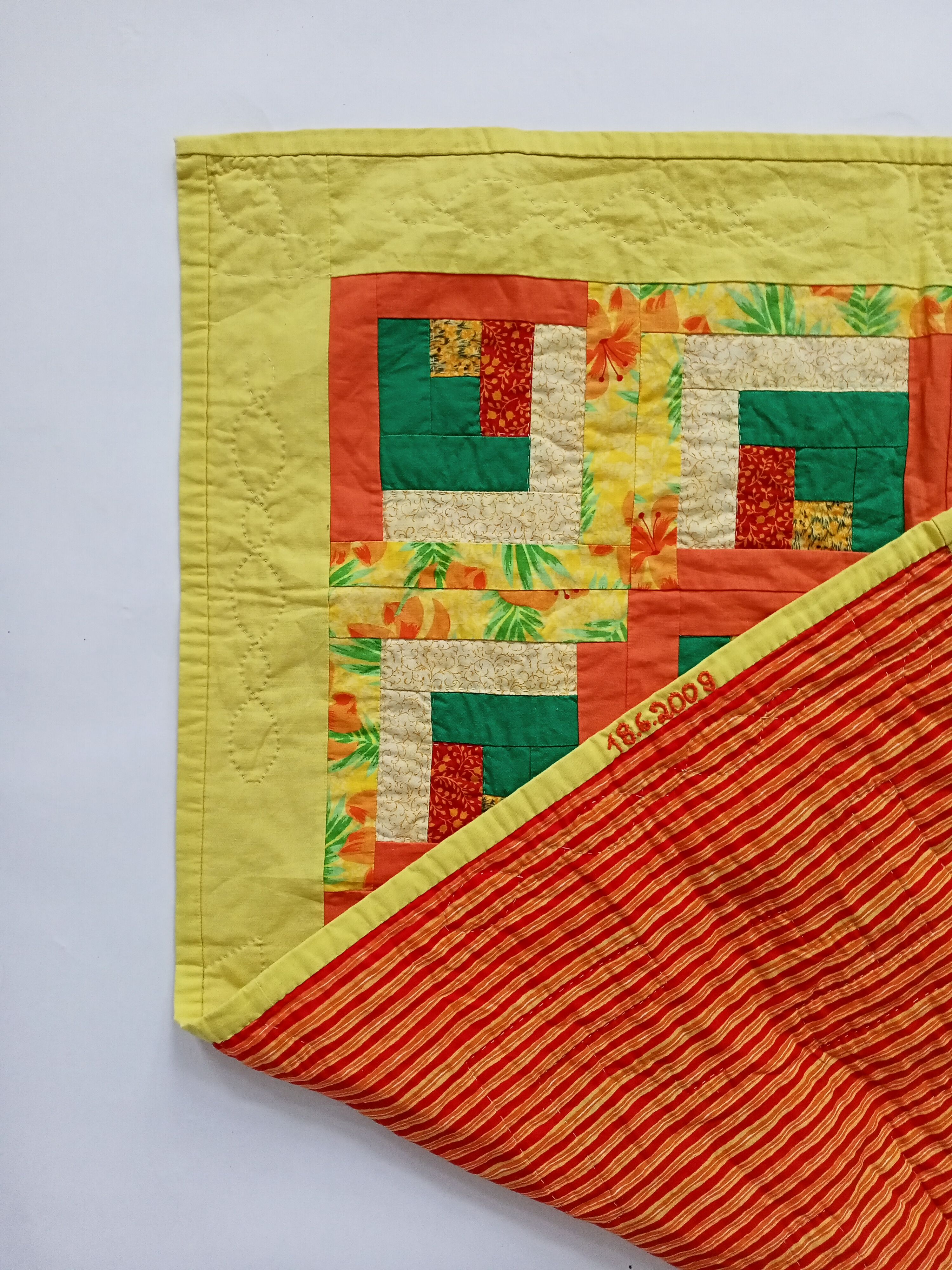 Baby quilt in patchwork quilt