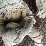 Stone child garden statue