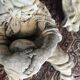 Stone child garden statue