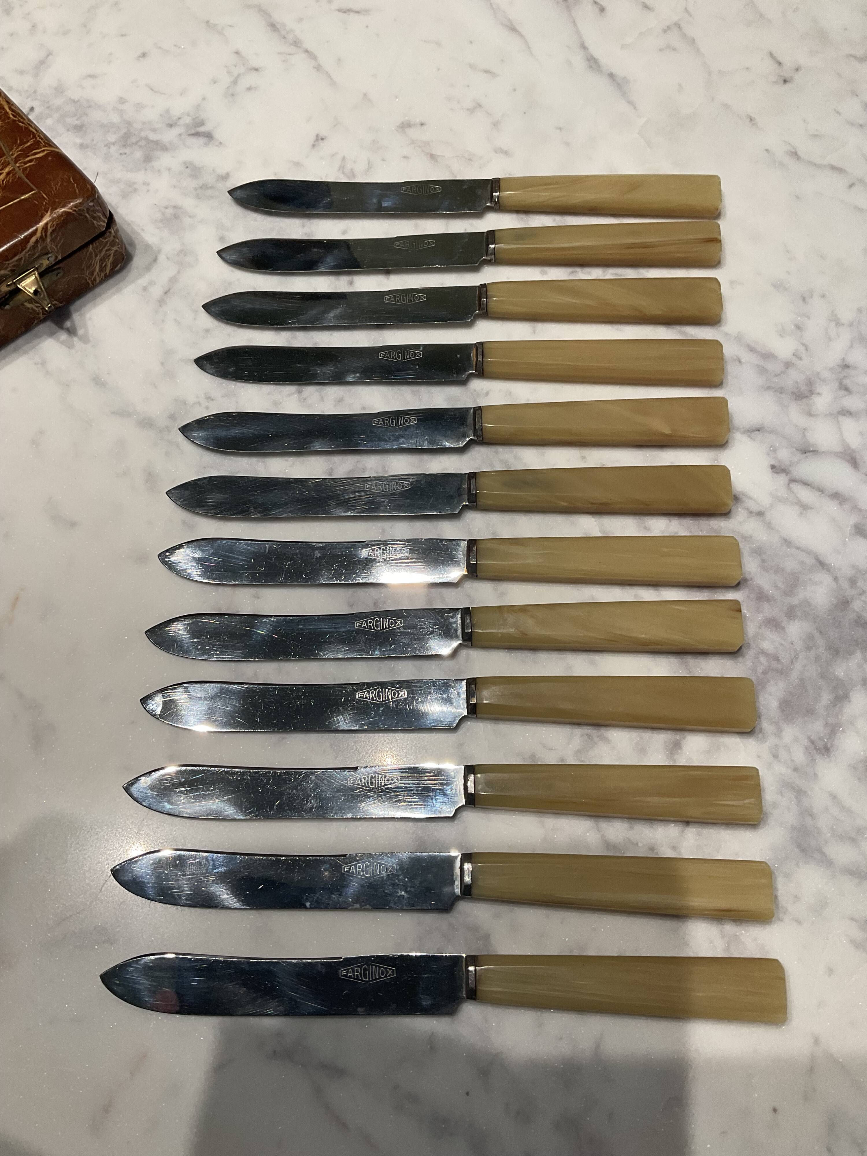 12 cheese knives. Vintage