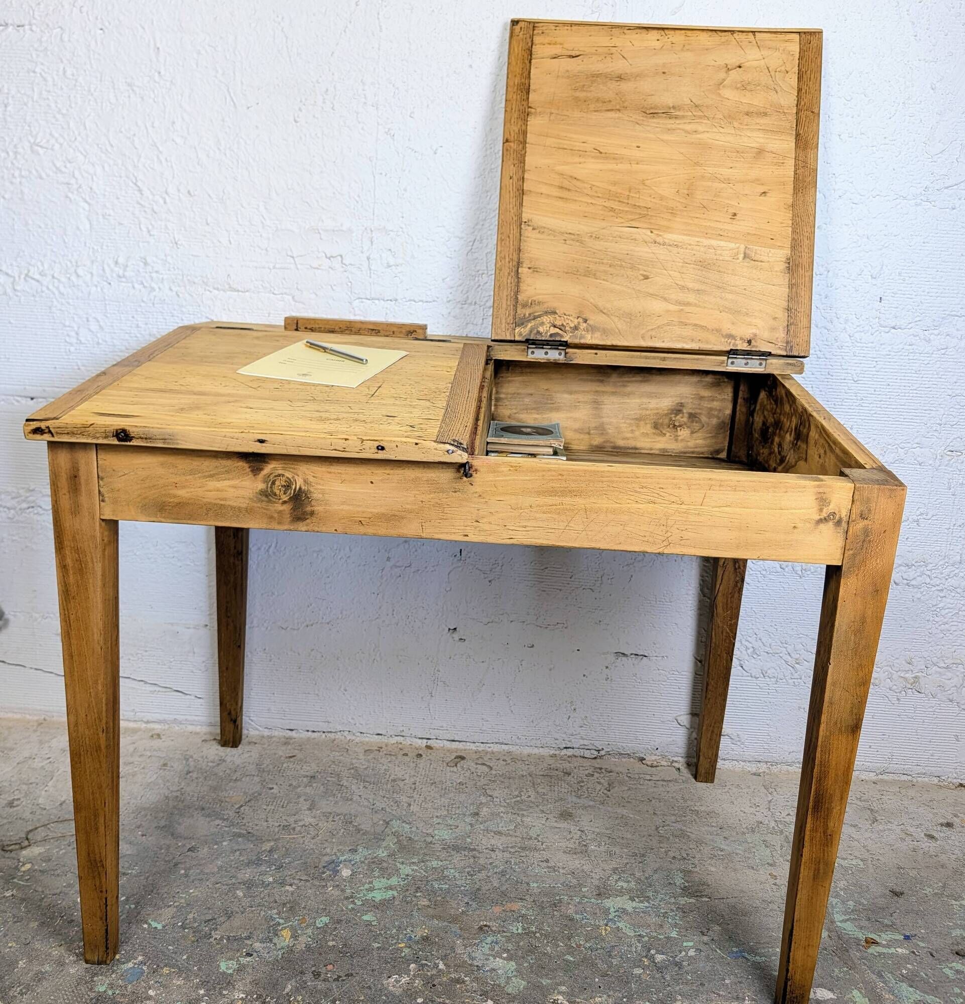 Antique wooden school desk with double lift-up tops.