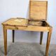 Antique wooden school desk with double lift-up tops.