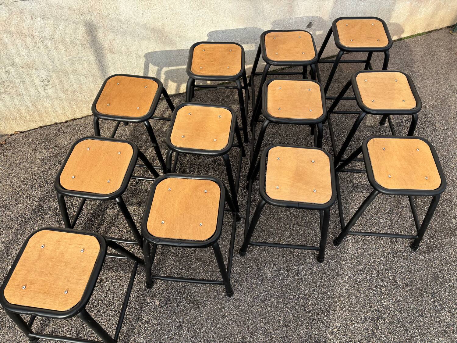 Set of 12 black industrial stools