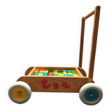 Walking trolley with multicolored wooden cubes