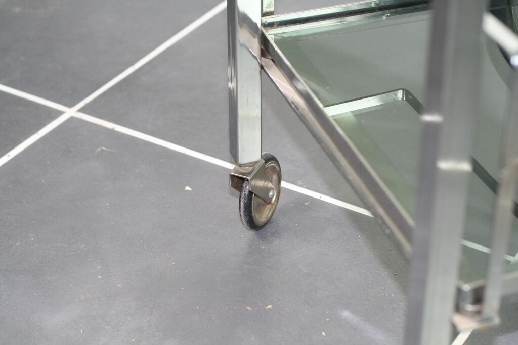 Furniture serves chrome metal and stainless steel 1960s rolling bar