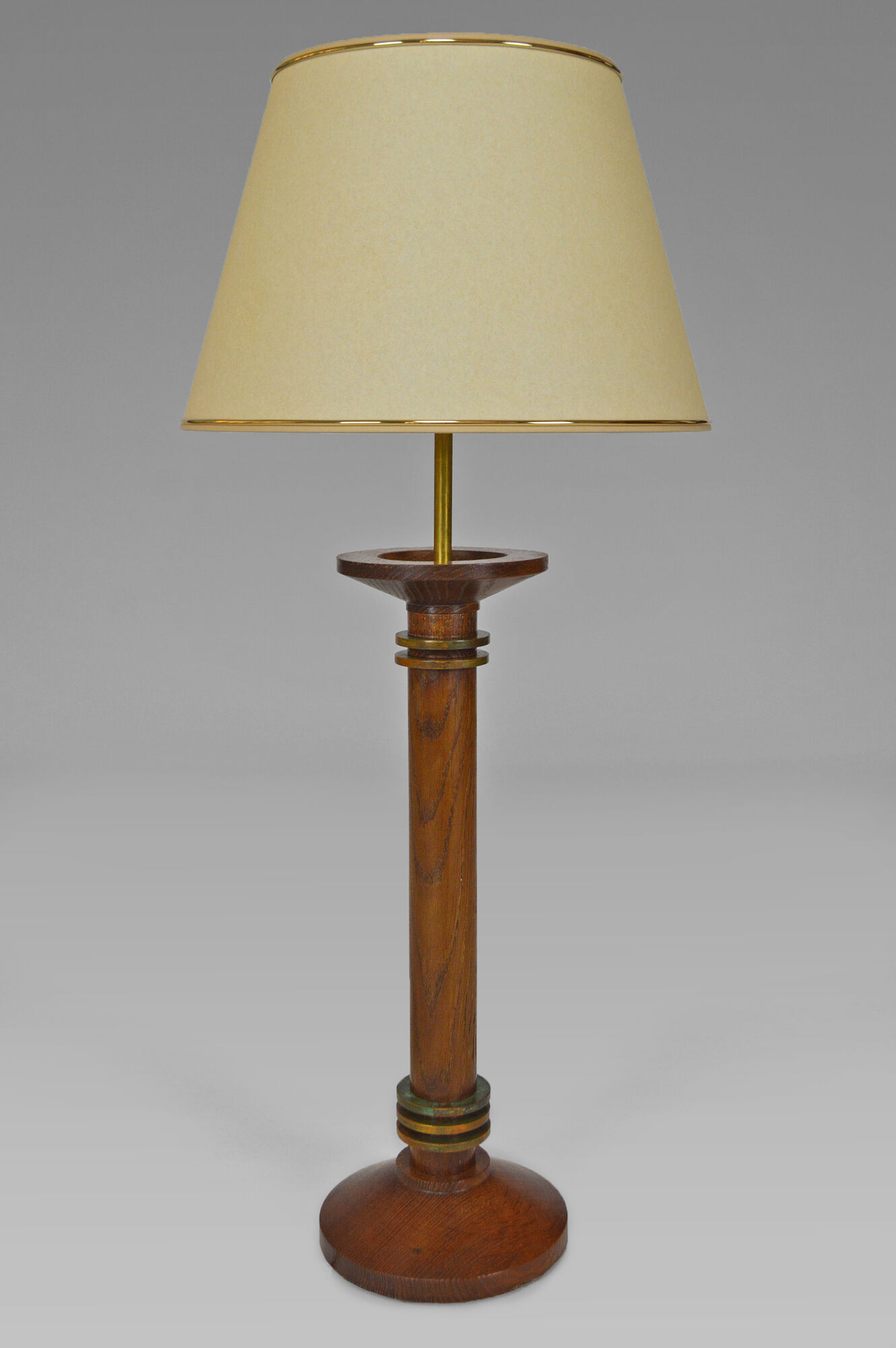Pair of art deco lamps in wood and patinated bronze around 1930
