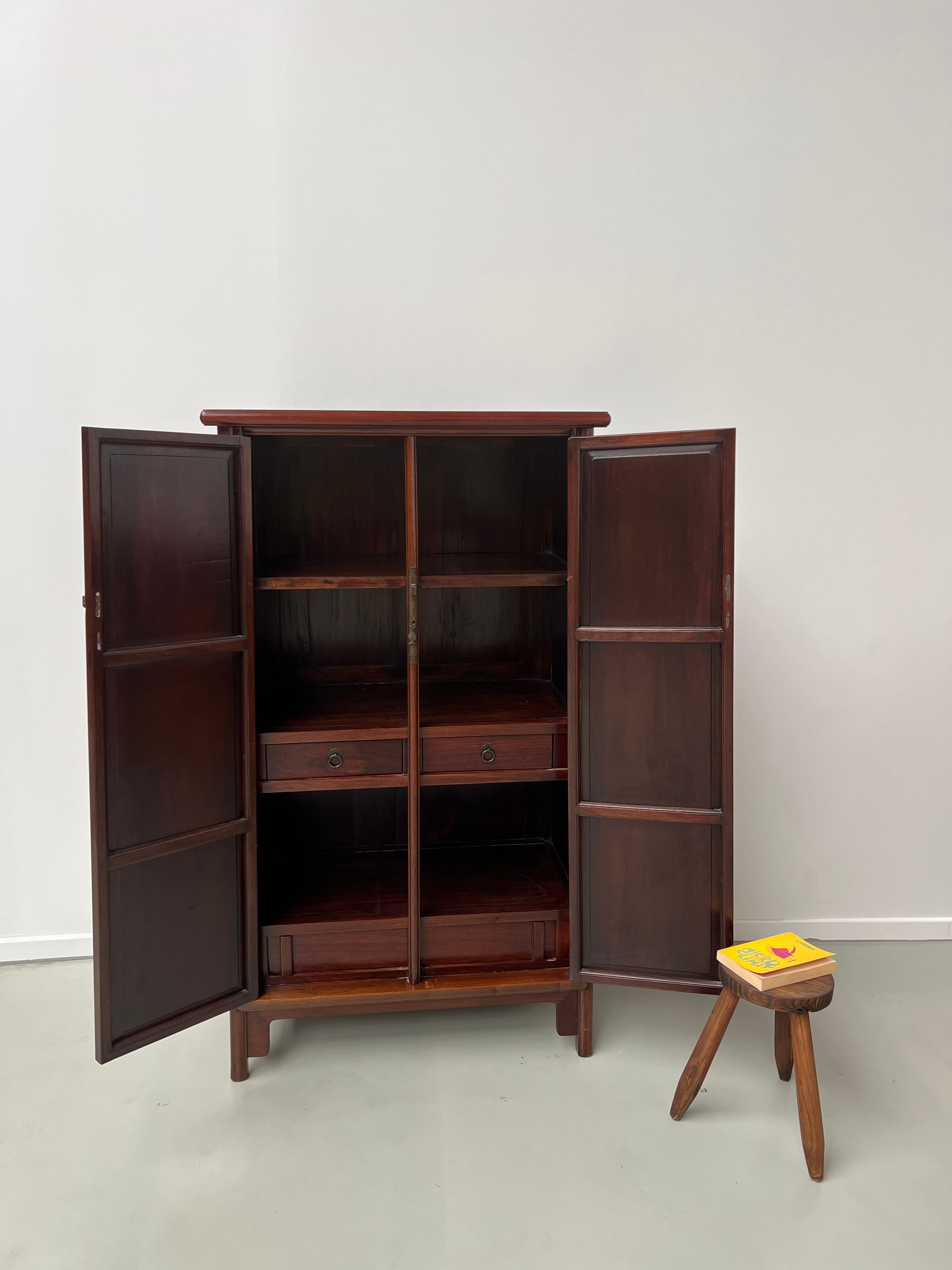 Chinese trapezoidal roller cabinet, made of rosewood.