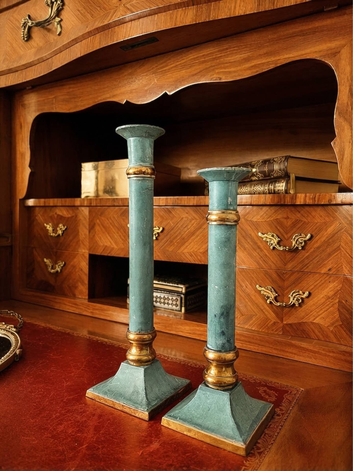 Exceptional pair of large candlesticks in patinated greenish-blue brass.