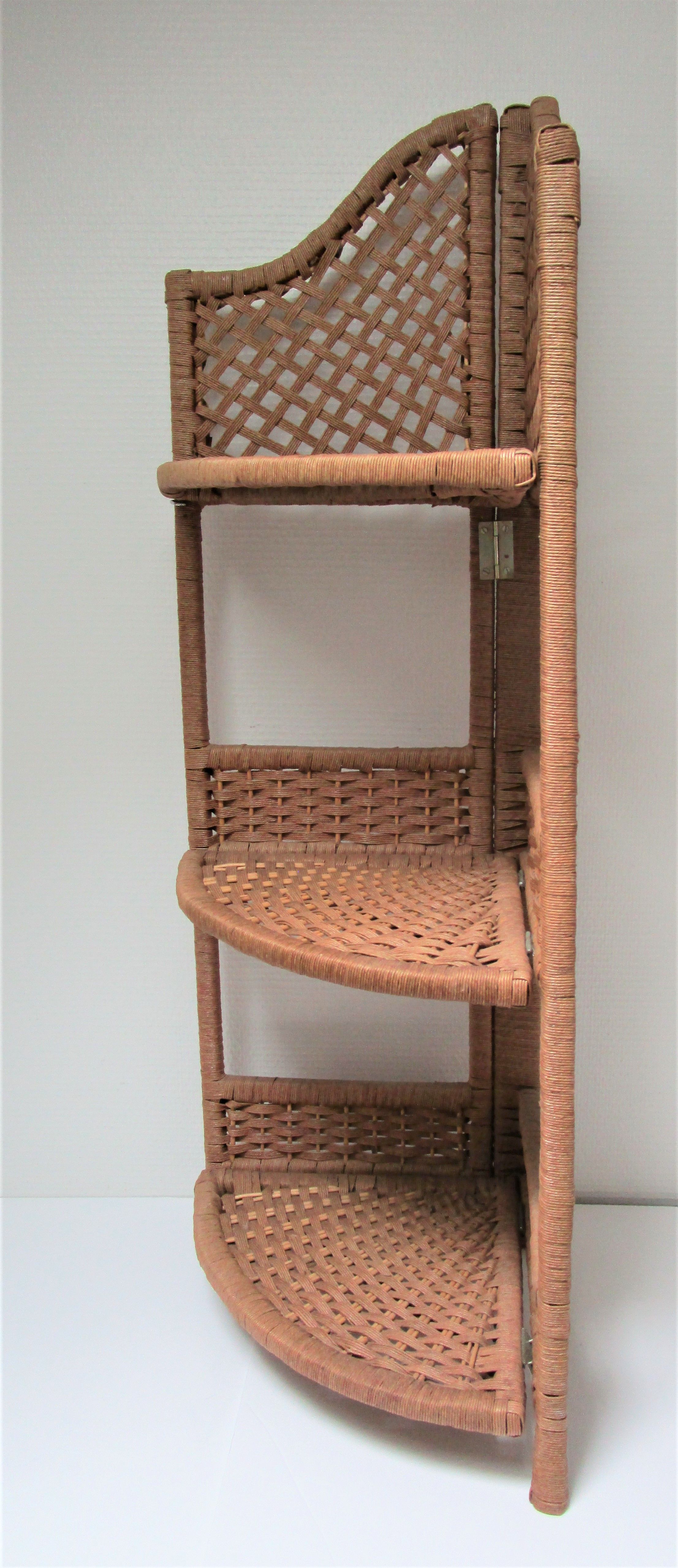 Corner shelf made of vintage braided natural fibers