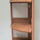 Corner shelf made of vintage braided natural fibers