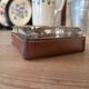 Empty pocket/ashtray in glass and leather