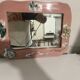 Vintage floral pink ceramic framed mirror signed St-Avit Francalat.