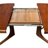 Baumann style wooden table with extensions.