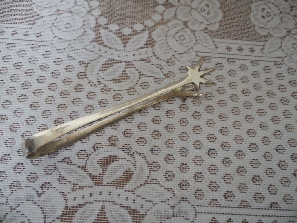 Silver-plated crow's feet claw