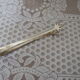 Silver-plated crow's feet claw