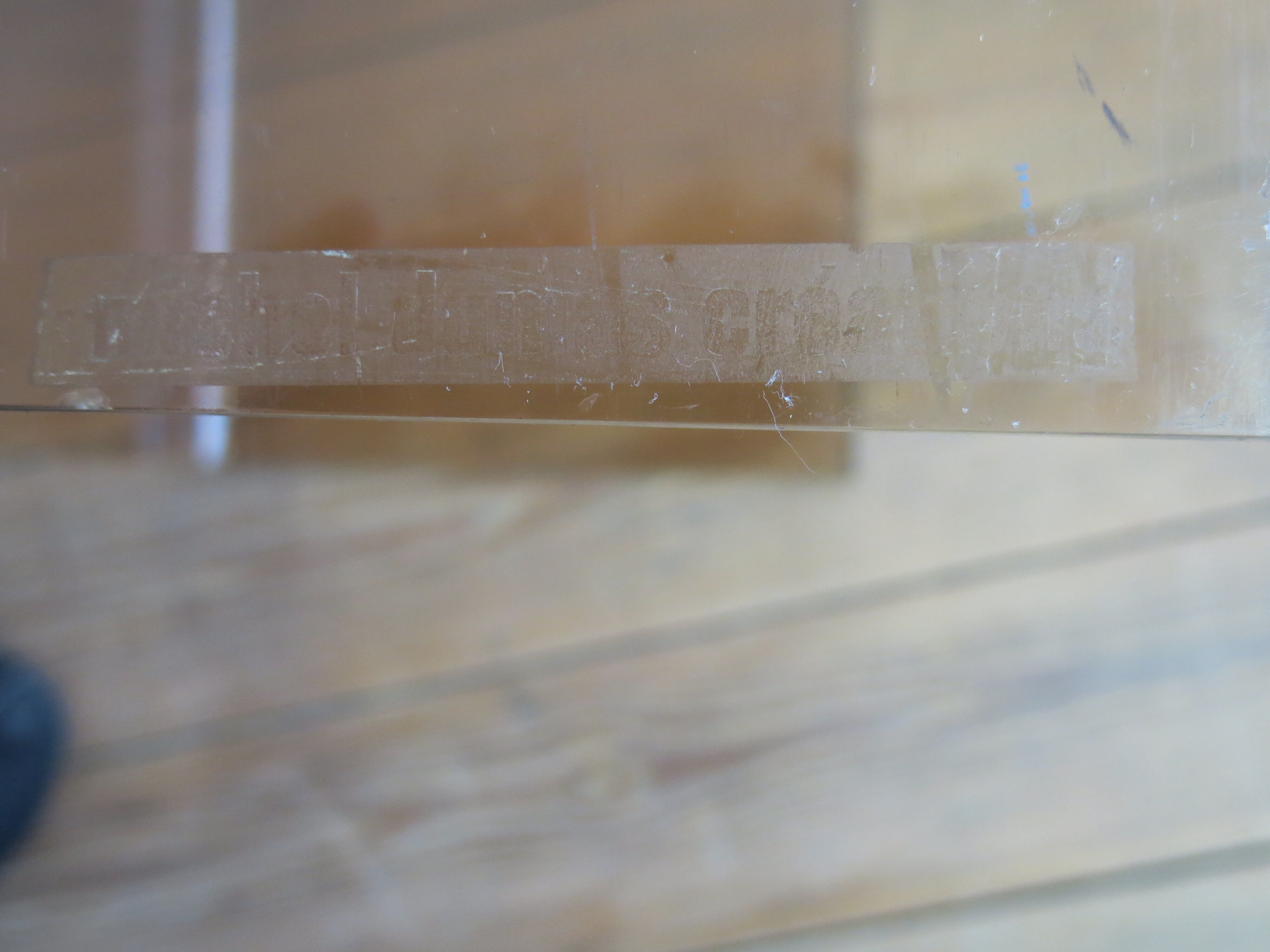 Trio of plexi nesting tables signed Michel Dumas