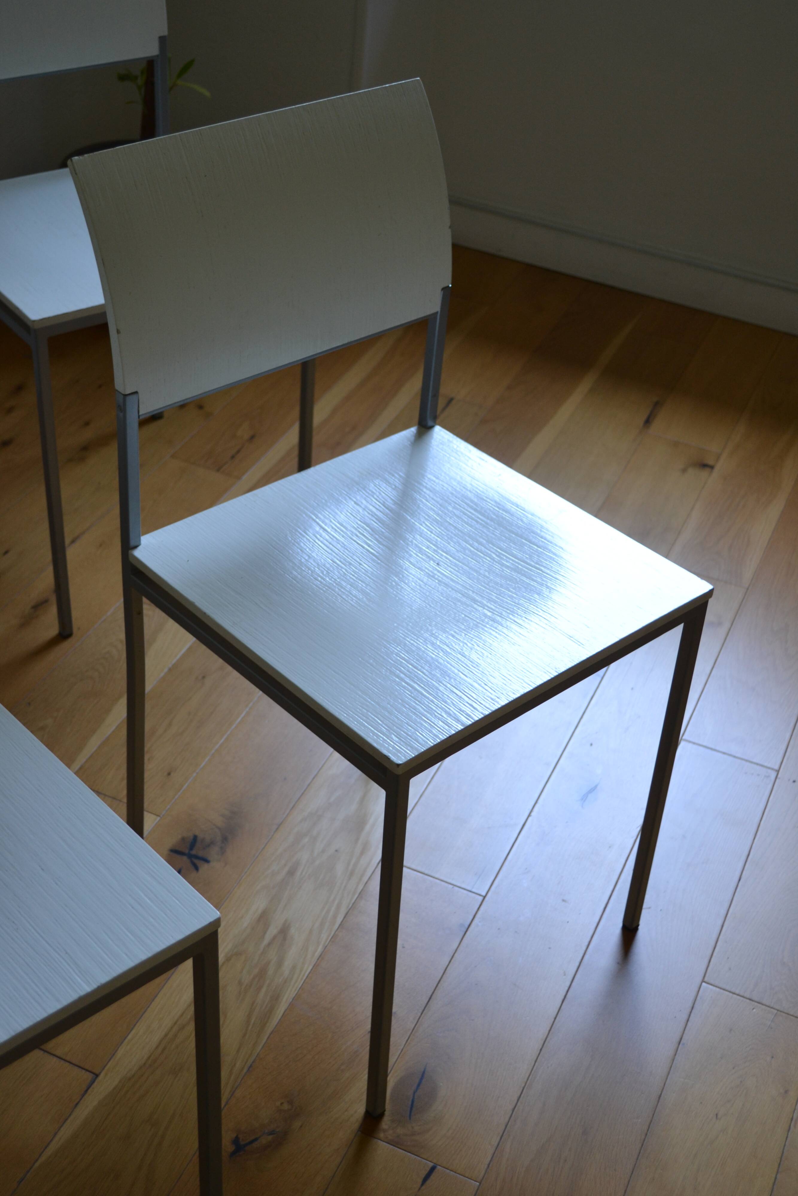 Set of 4 vintage metal and wood chairs from the 1990s.