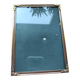 Vintage photo frame in gold and decorated metal