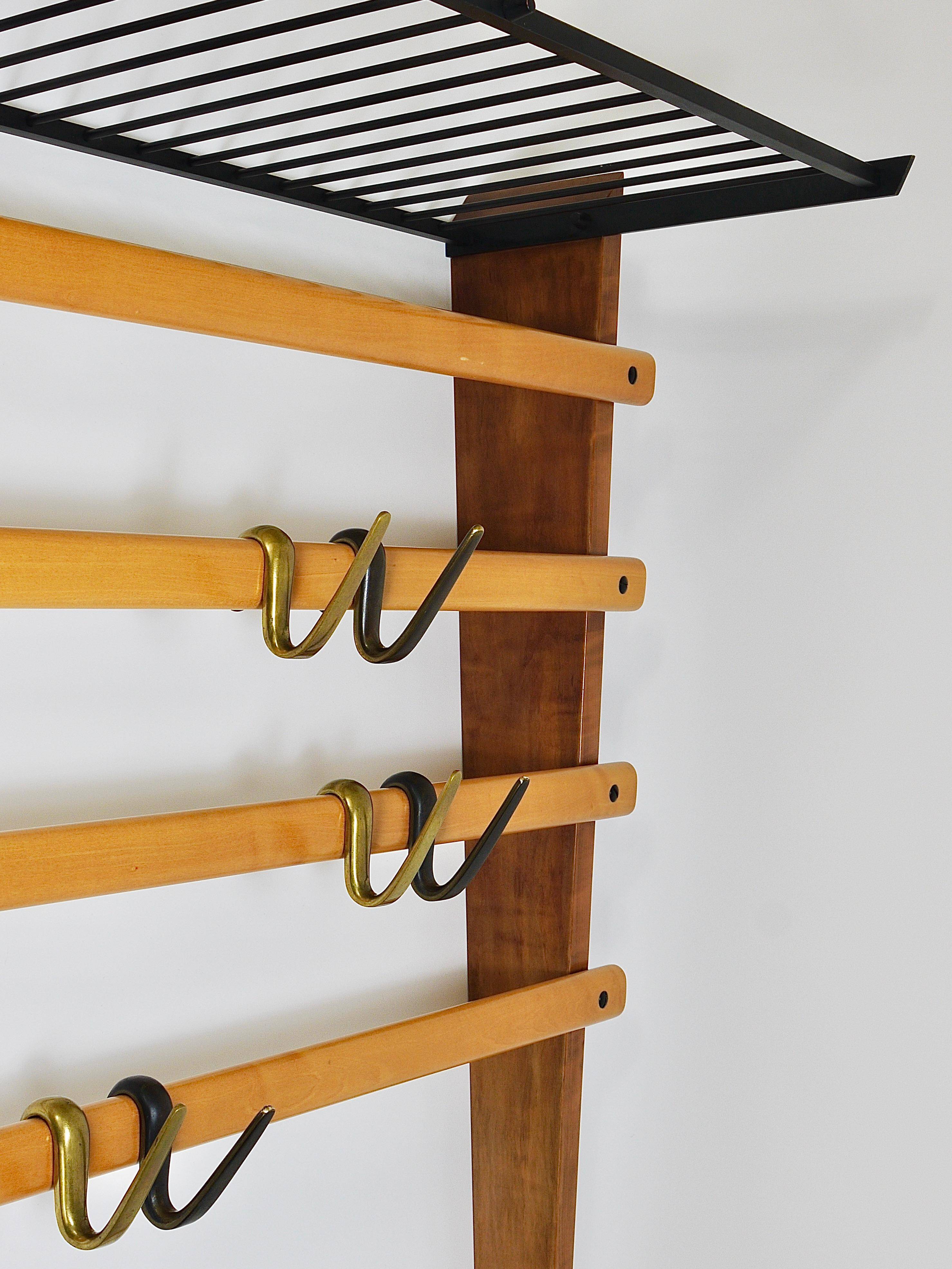 Rare coat rack by Carl Auböck with hat rack, cabinet, brass, walnut and beech, 1950s.