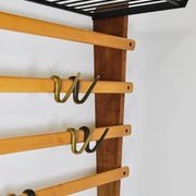Rare coat rack by Carl Auböck with hat rack, cabinet, brass, walnut and beech, 1950s.