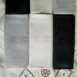 Old damask tablecloth with monogram