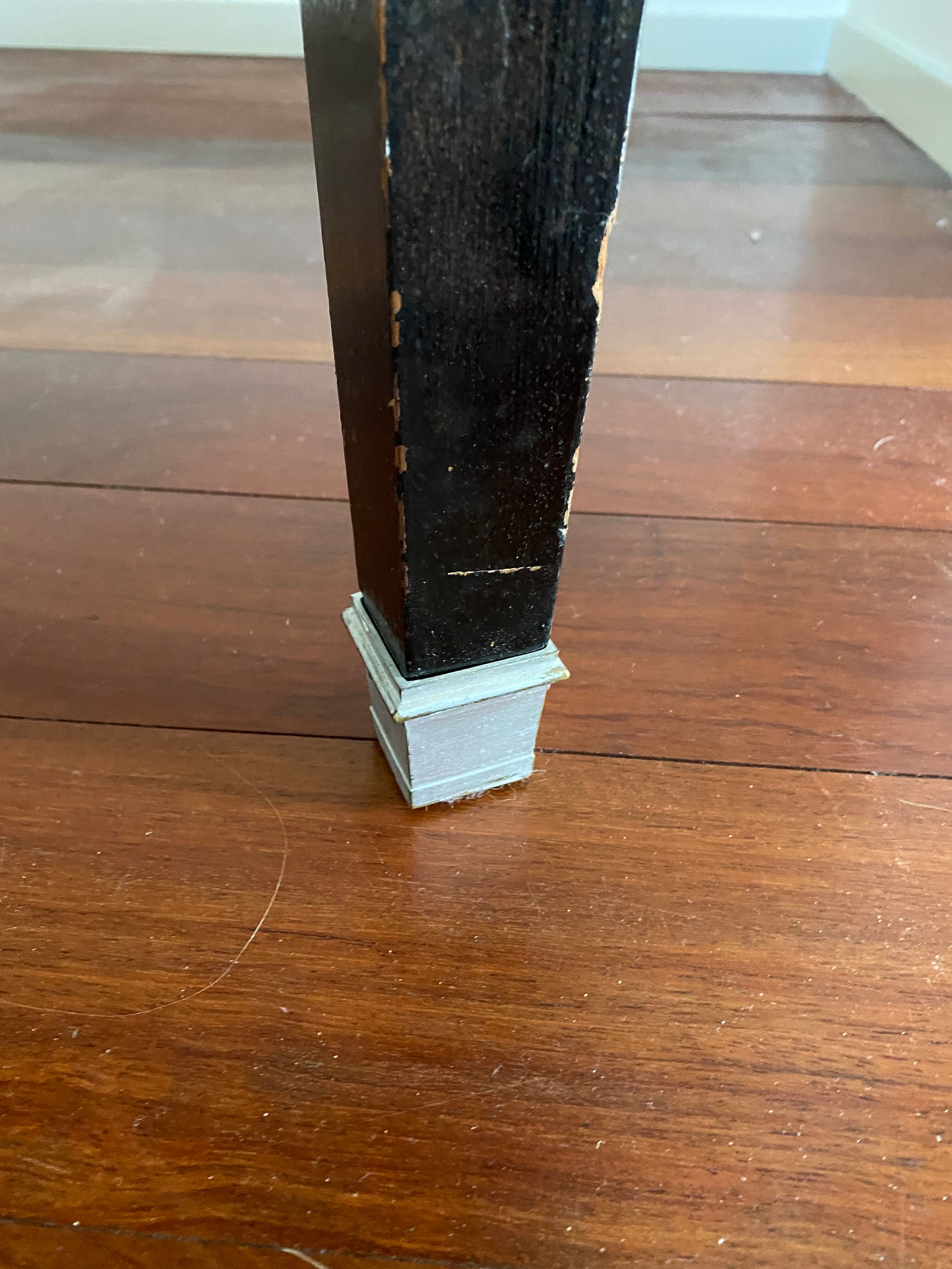 Mahogany round table painted black