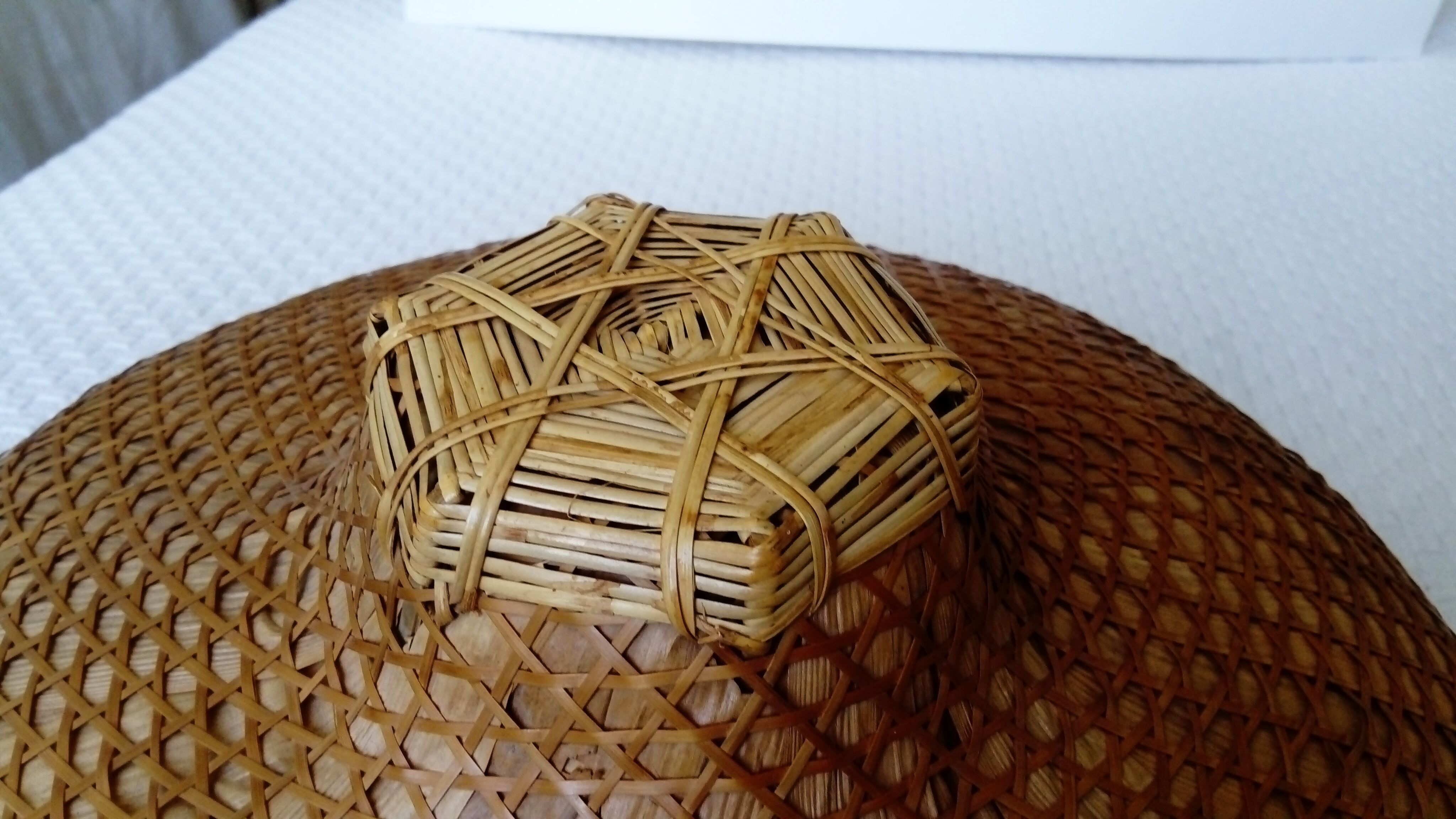 Asian hat braided.