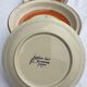Set 11 plates 1970 Revernay Sarreguemines orange and brown on sandstone background
