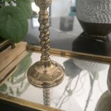 Twisted candlestick in gold metal