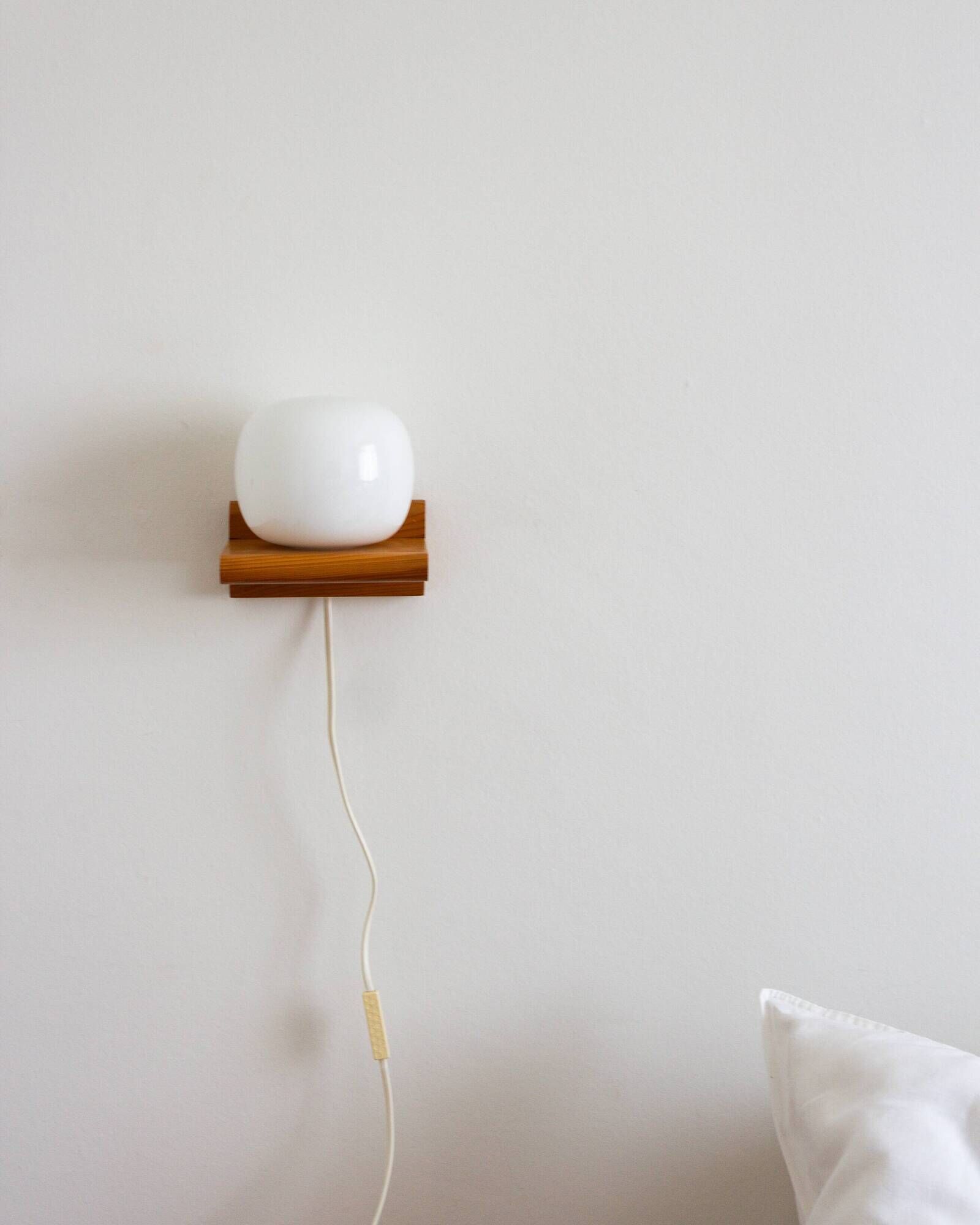 Pair of pine and opaline wall lights, 70s/80s