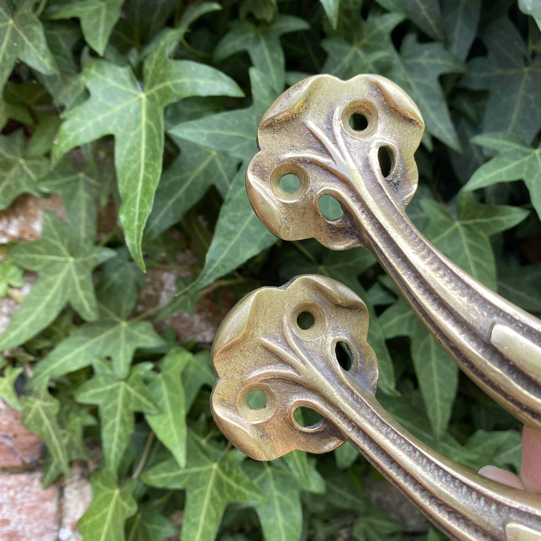 Pair of antique Art Nouveau brass handles