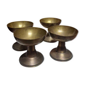 Set of four brass aperitif cups