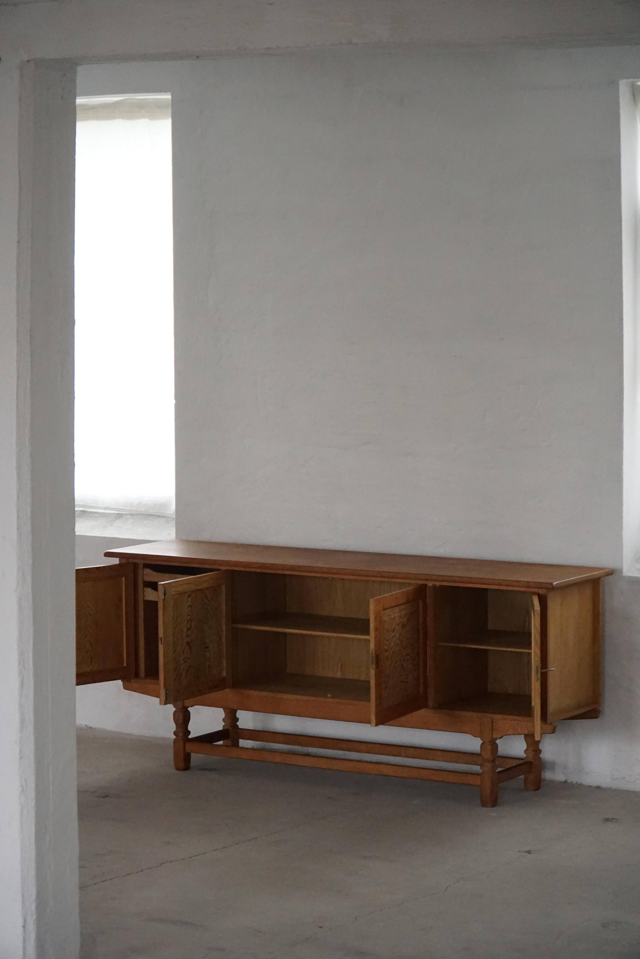 Low oak sideboard, mid-century modern, made by a Danish cabinetmaker, 1960s.