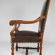 Louis XIII office armchair in leather and walnut carved around 1860