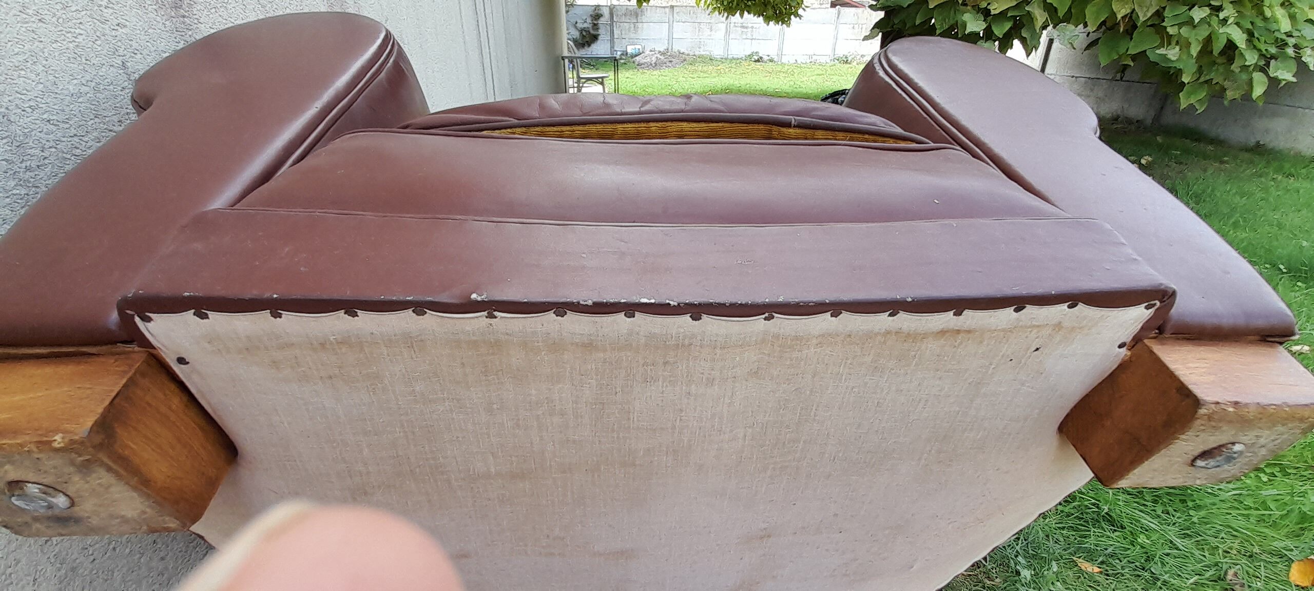 Club armchair in brown skai back mustache