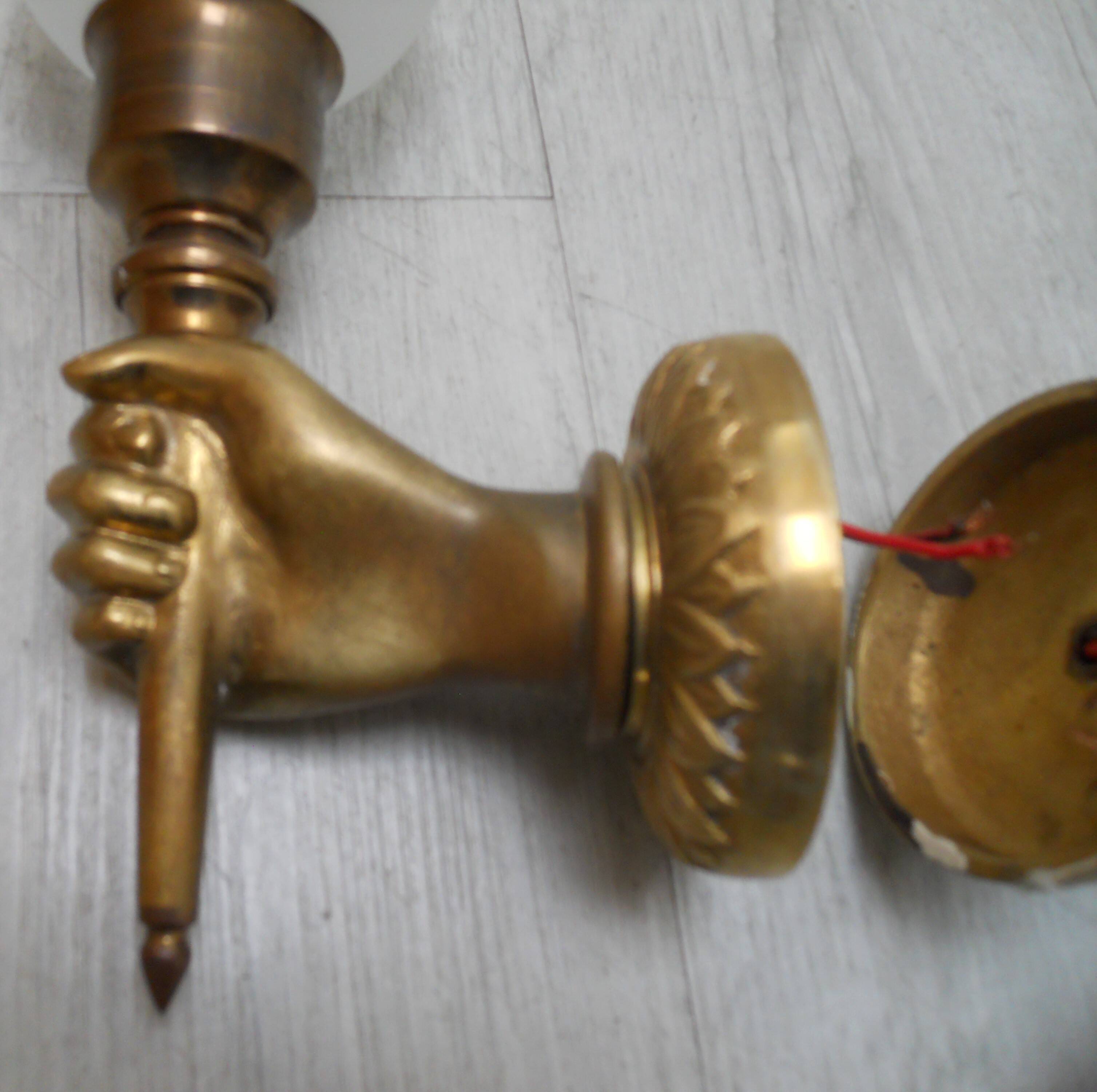 Pair of golden bronze flambeau sconces