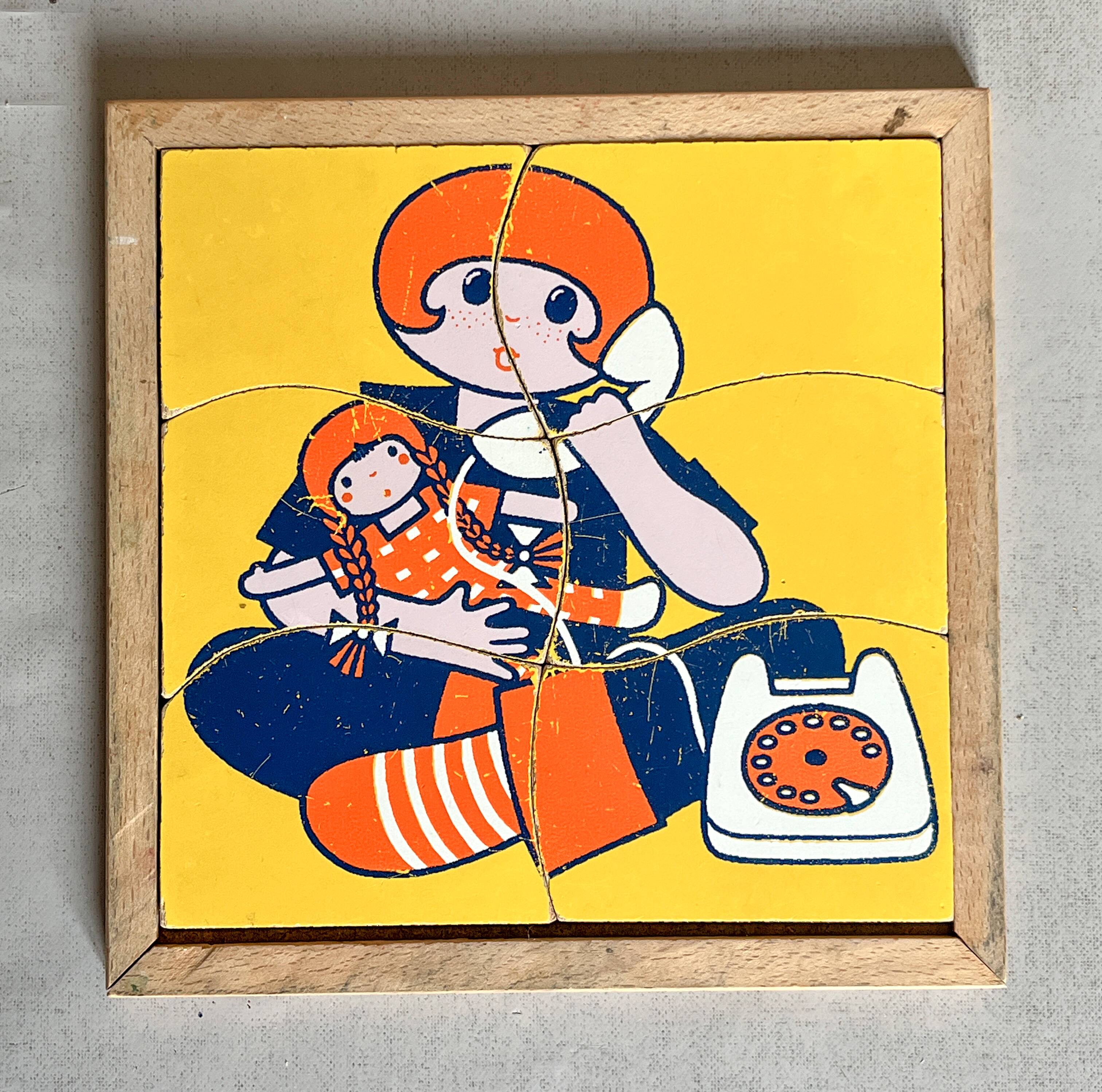 Wooden frame puzzle from the 60s/70s depicting a young girl.