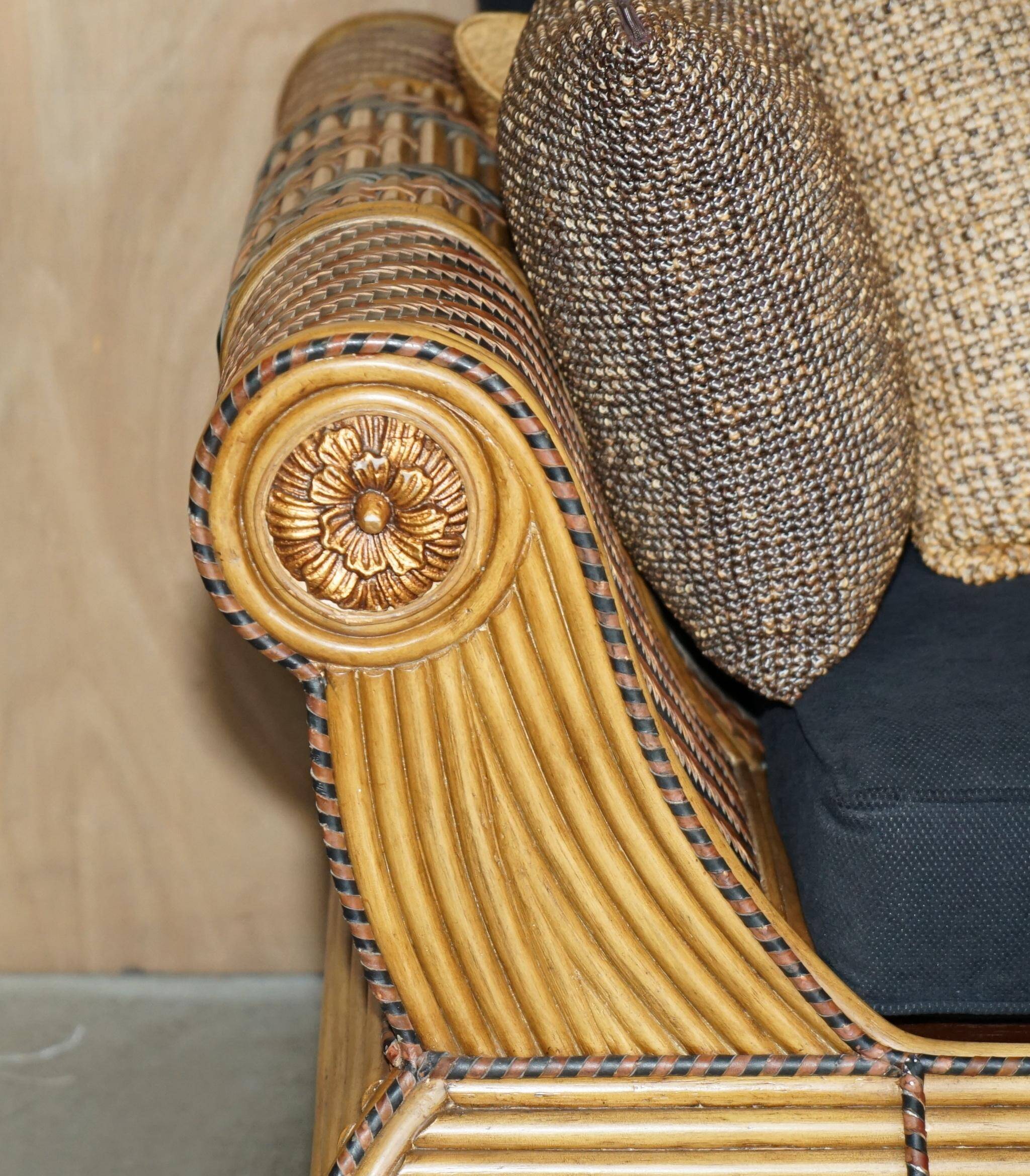 Vintage 1970s canapé with bamboo frame and Aztec patterns.